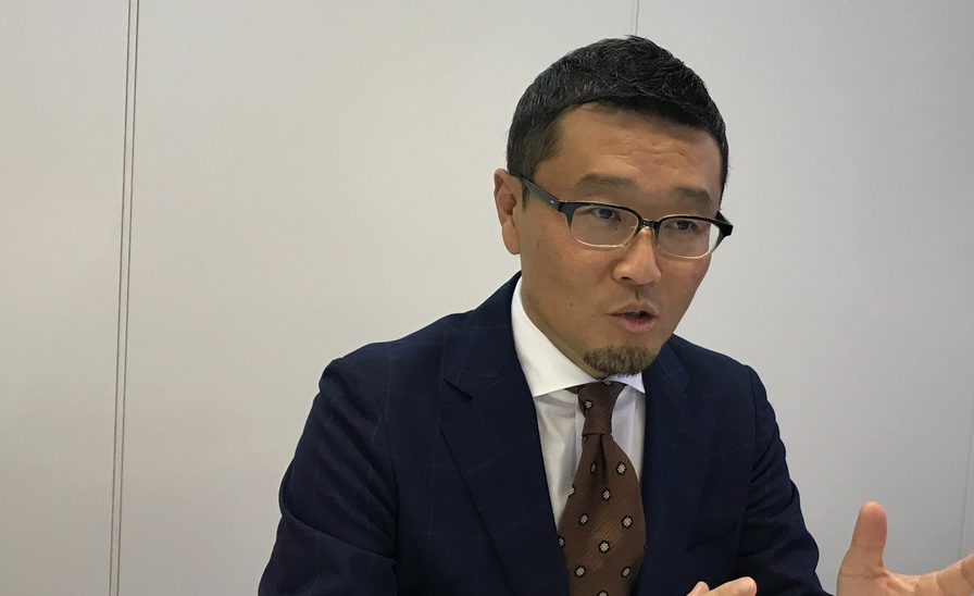 岡 卓也